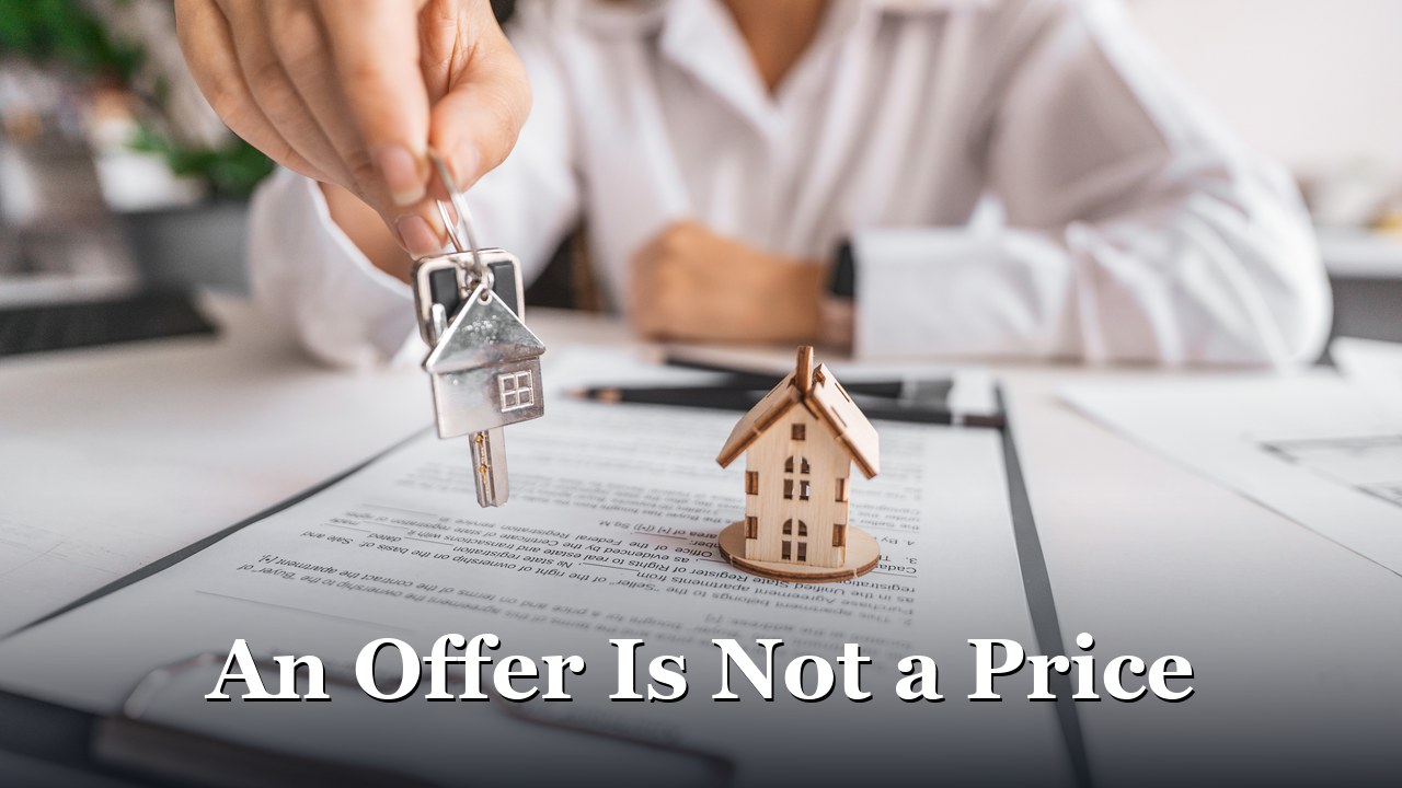 House keys held over a signed Maryland purchase agreement, where the terms that decide the deal actually live.